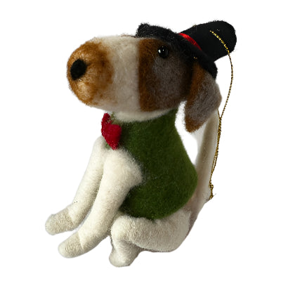 Dog-shaped ornament wearing a top hat and green coat on a plain background
