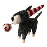 Small plush schnauzer with a striped cone hat on a white background