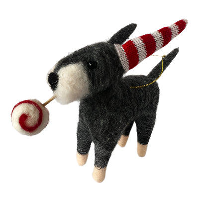 Small plush schnauzer with a striped cone hat on a white background