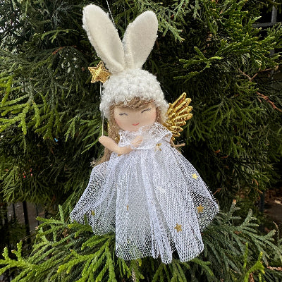Angel figurine ornament on a Christmas tree