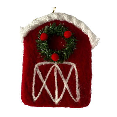 Red square ornament with green wreath and white spiral design on a light gray background