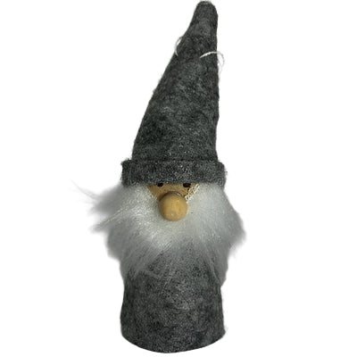 Gray felt gnome with white beard on a light gray background