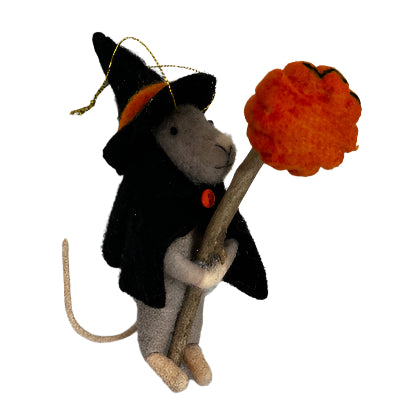 Felted decorative mouse witch with a pumpkin on a white background