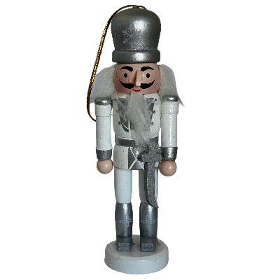 Wooden nutcracker figure on a white background