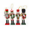 Set of four Nutcracker Christmas ornaments on a white background
